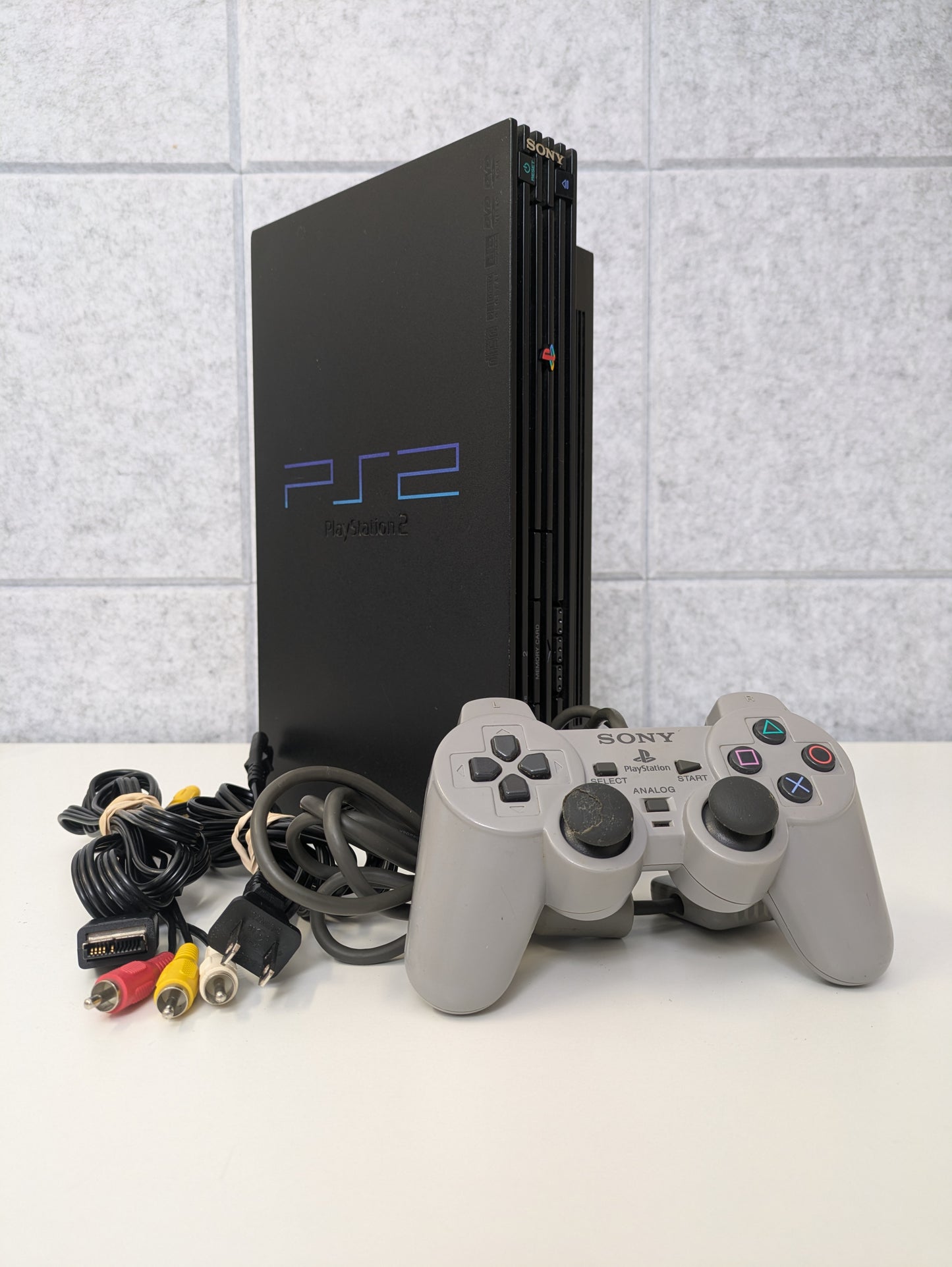Sony PlayStation 2 PS2 w/ controller, power cord, and A/V cable - USED