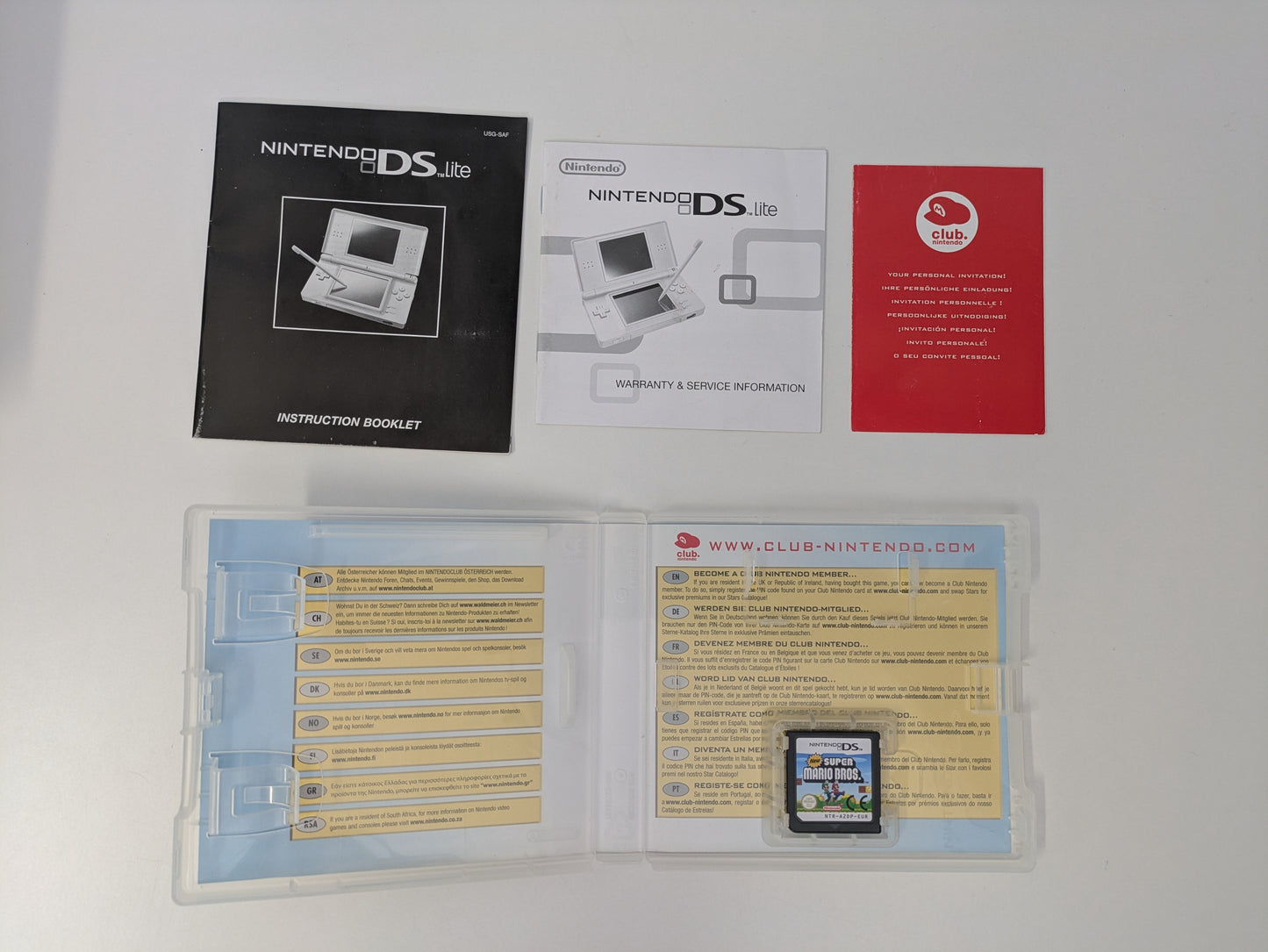 Nintendo DS Lite - Lime Green - PAL Variant - New Super Mario Bros. Bundle - Official Licensed Nintendo Refurbished Product - Used