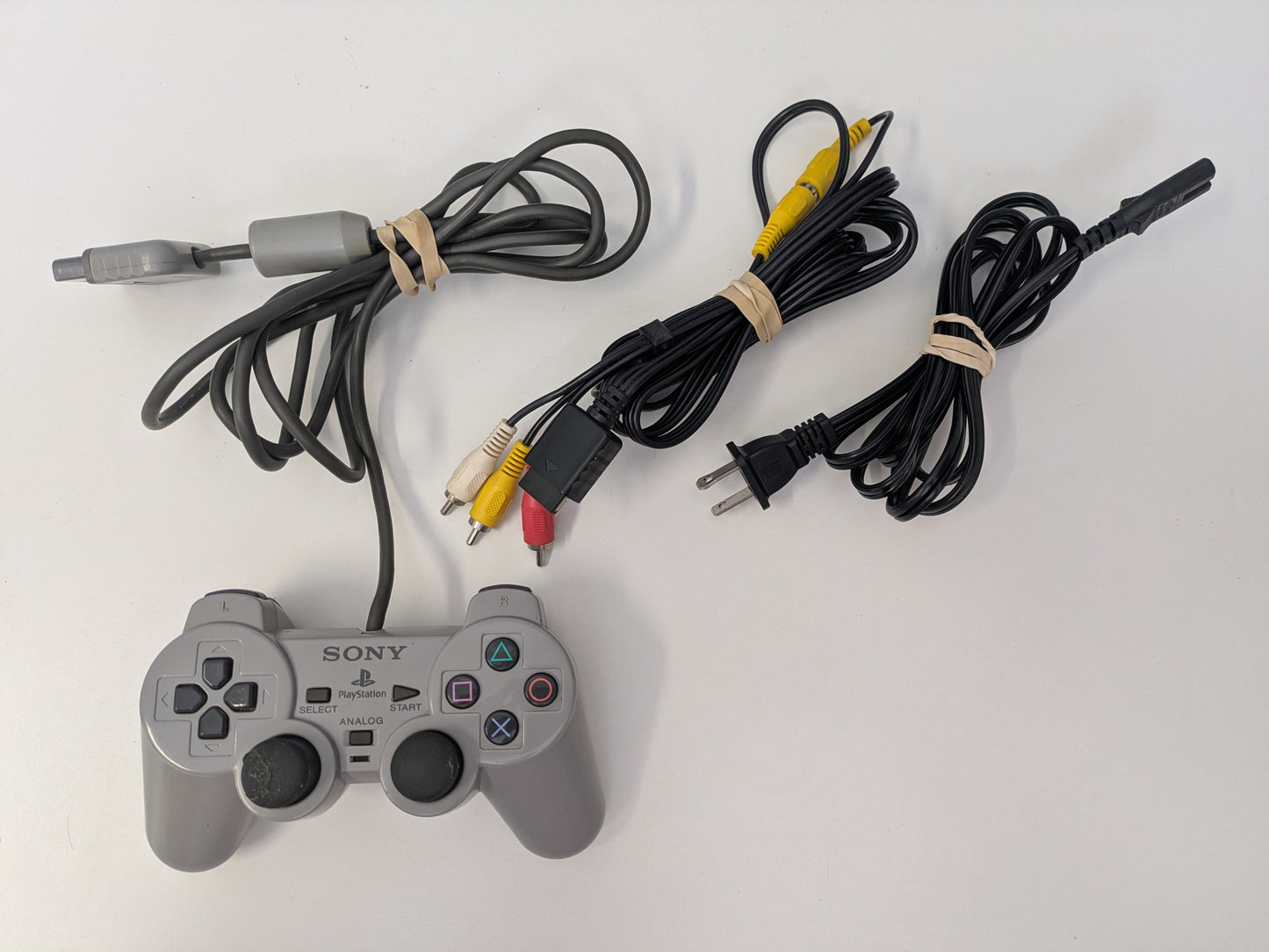 Sony PlayStation 2 PS2 w/ controller, power cord, and A/V cable - USED