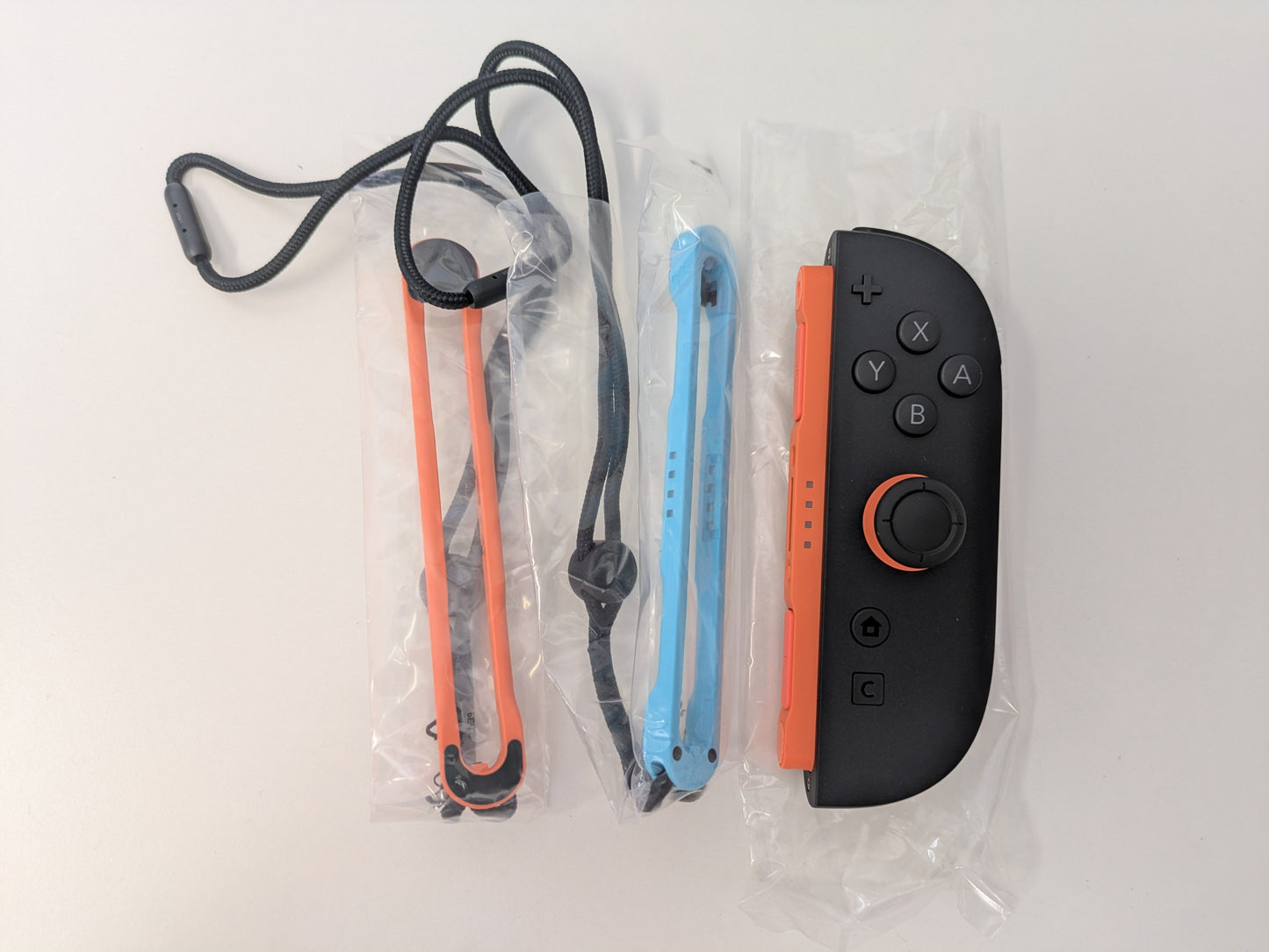 Nintendo Right Joy-Con (Red) + Wrist Straps - Used