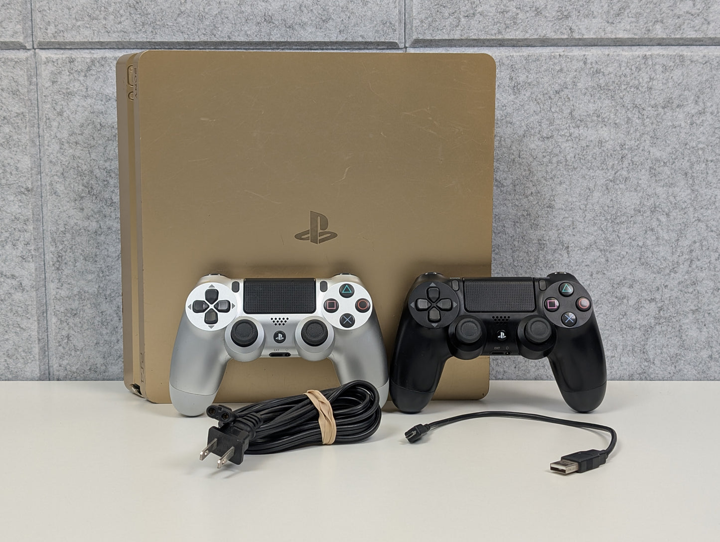 Sony PlayStation 4 Slim w/ accessories - 1TB - Gold - USED