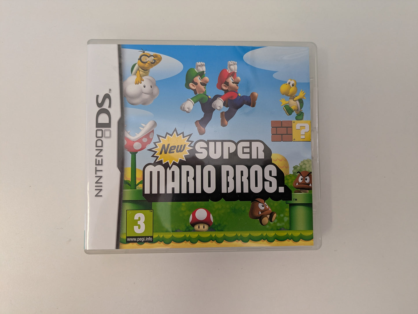 Nintendo DS Lite - Lime Green - PAL Variant - New Super Mario Bros. Bundle - Official Licensed Nintendo Refurbished Product - Used