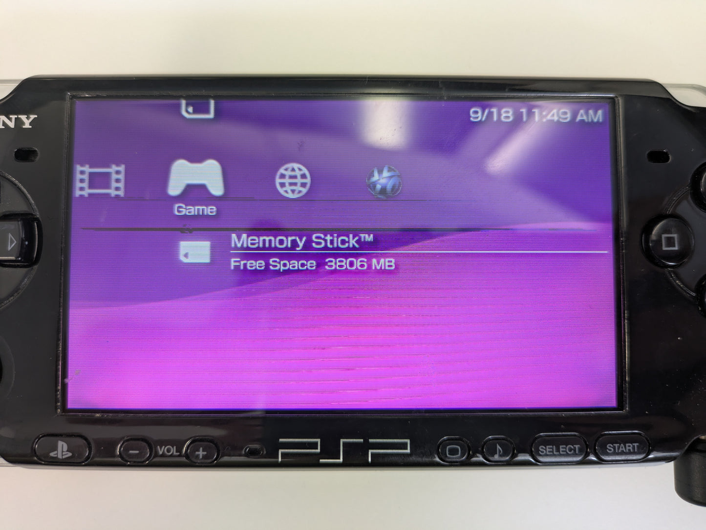 Sony PlayStation Portable PSP PSP3001c - CONSOLE ONLY - DISPLAY ISSUES, MISSING BATTERY & BATTERY DOOR - AS-IS