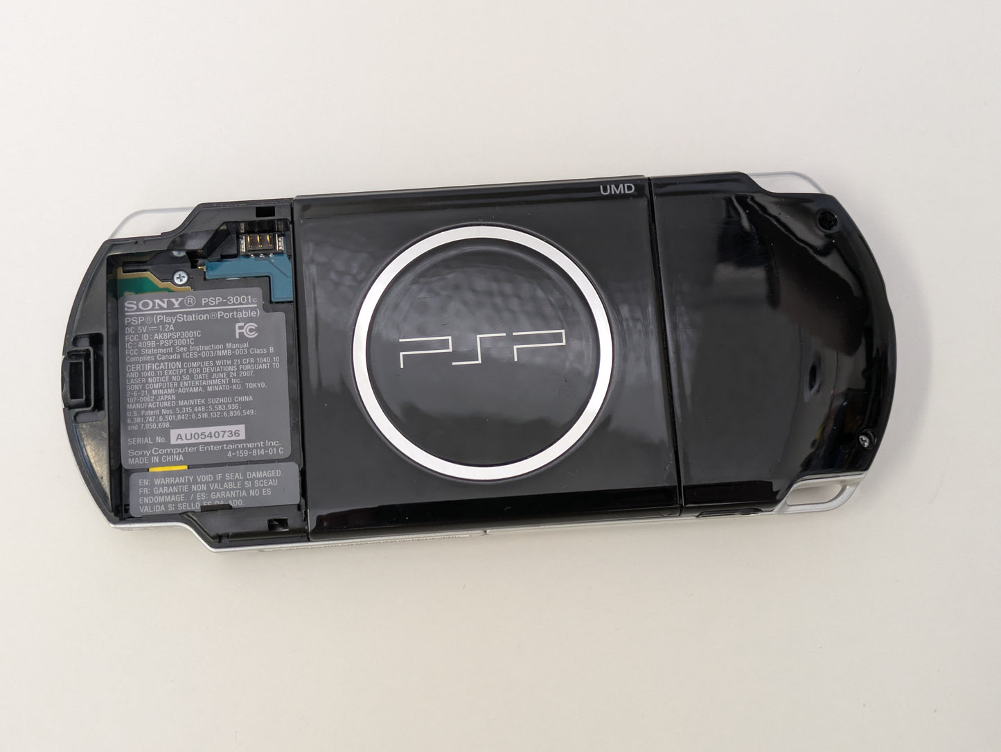 Sony PlayStation Portable PSP PSP3001c - CONSOLE ONLY - DISPLAY ISSUES, MISSING BATTERY & BATTERY DOOR - AS-IS