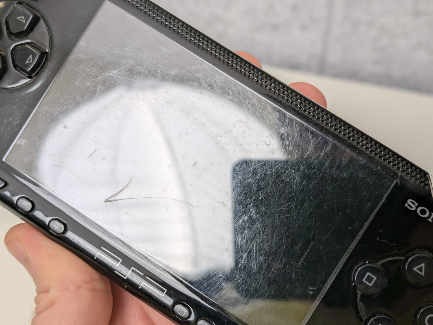 Sony PlayStation Portable PSP PSP1001 - CONSOLE ONLY - MISSING BATTERY, BATTERY DOOR & THUMBGRIP - AS-IS
