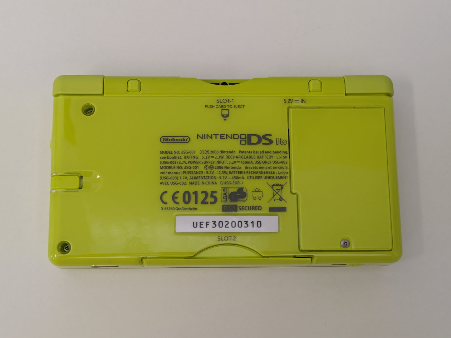 Nintendo DS Lite - Lime Green - PAL Variant - New Super Mario Bros. Bundle - Official Licensed Nintendo Refurbished Product - Used