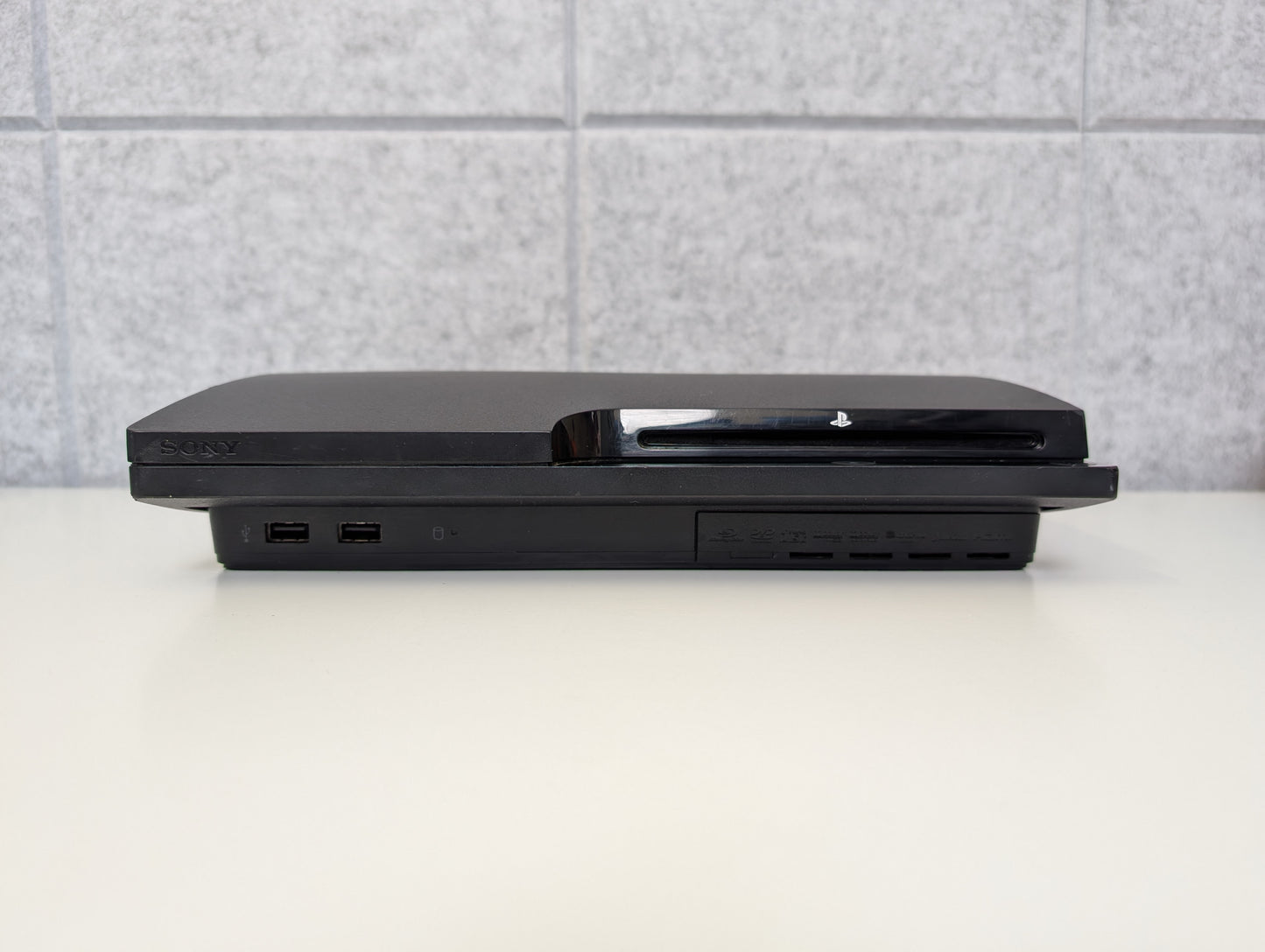 Sony PlayStation 3 Slim w/ accessories - 320GB - AS-IS