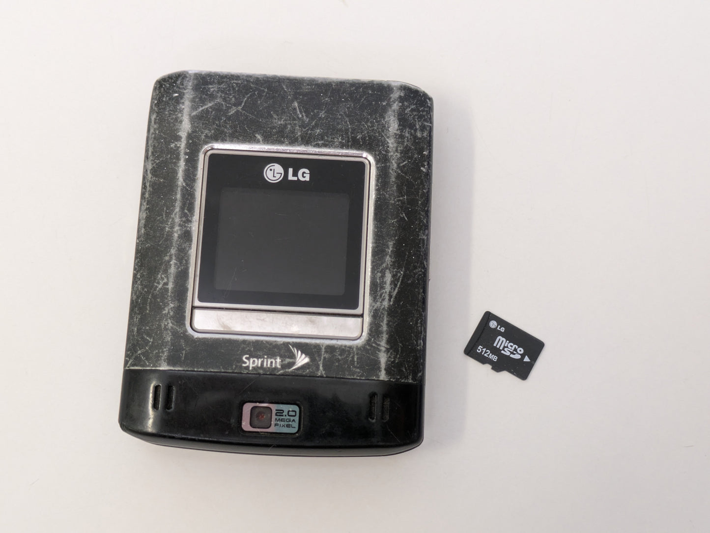 LG Lotus LX600 (Network Locked to Sprint) - 512MB - Matte Black - USED