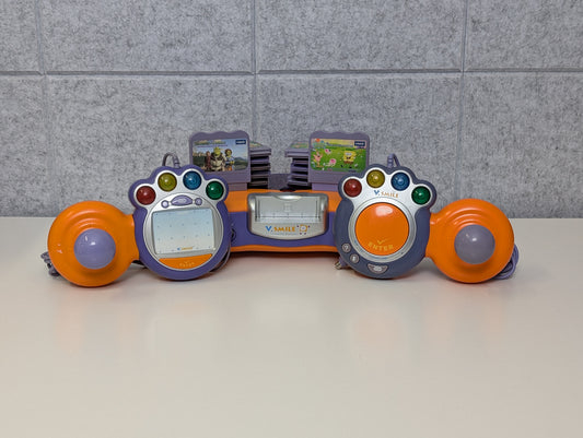 V-tech V.Smile TV Learning System w/ 12 games - Orange - USED